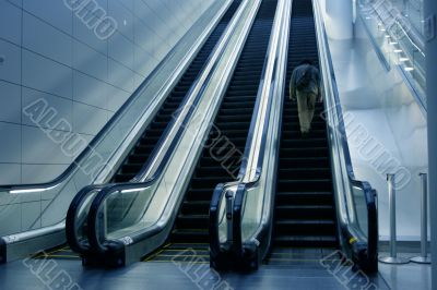 Man on escalator