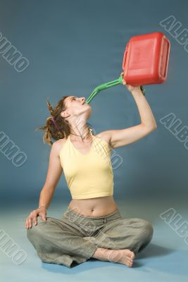 woman drinks of jerry can