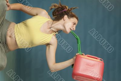 woman drinks of jerry can