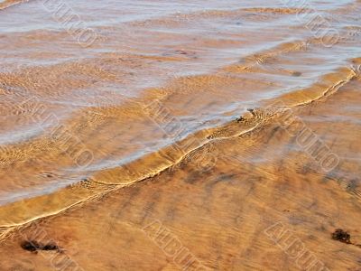 Water, sand, waves