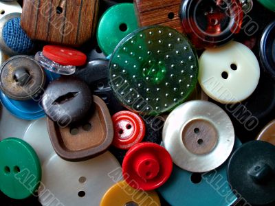 background: buttons pile