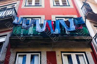 Jeans dried on a balcony