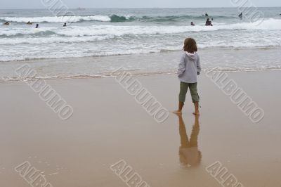 girl looking at ocean