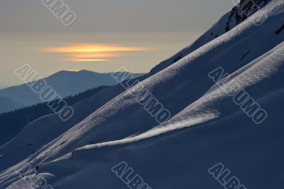 sunset landscape with mountains and sea