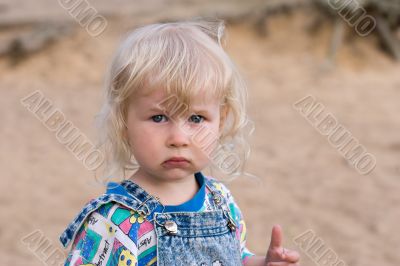 blonde sad little girl