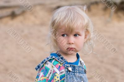 blonde sad little girl