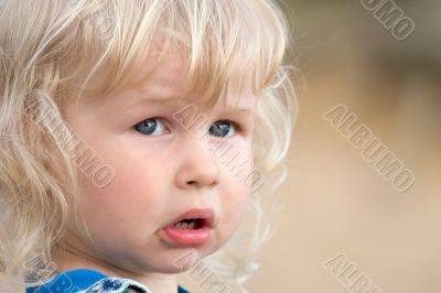 blonde sad little girl