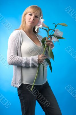 happy pregnant woman with flower