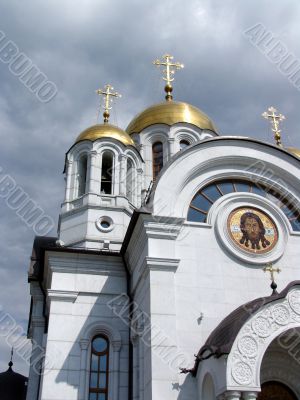 Christian cathedral on a background overcast sky