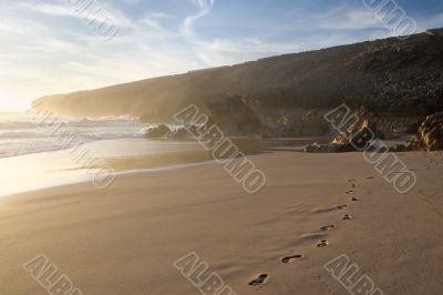 footprints on the beach