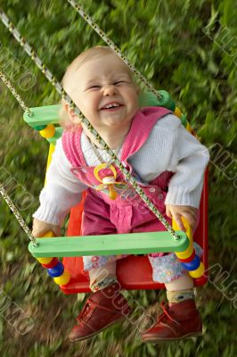 child on swing