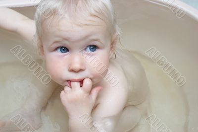portrait of baby in bath