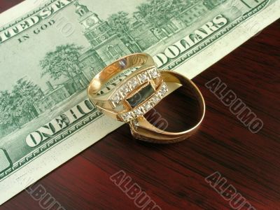 Money and gold jewelry