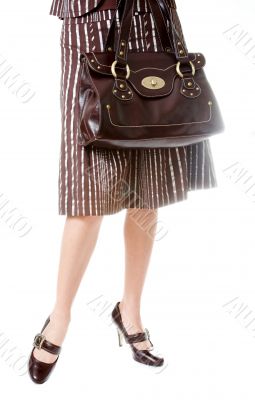 woman with beautiful legs holding bag