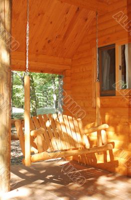 cabin with porch swing