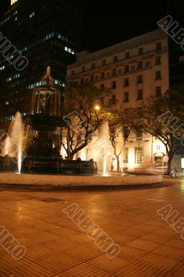 Fountain and piazza at night