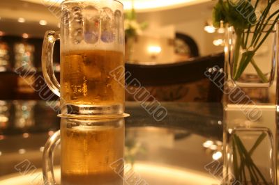 Beer glass on table