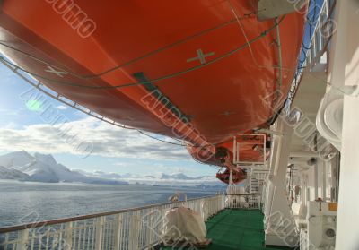 Life boats and cruise ship deck