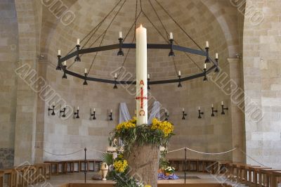 Candle with the crucifixion.