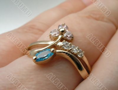 Golden ring on a female hand