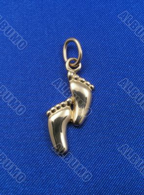 Golden foots on blue background