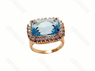 Golden ring with sapphire and diamonds