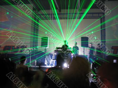DJ in a view of the green laser