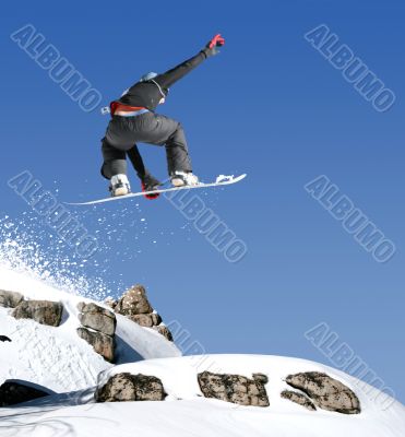 Snowboarder jumping