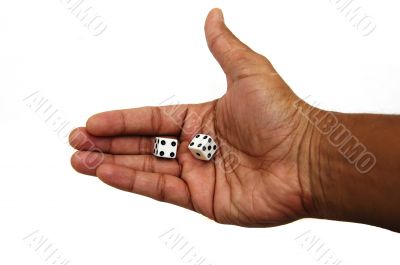 Pair of dice in a hand
