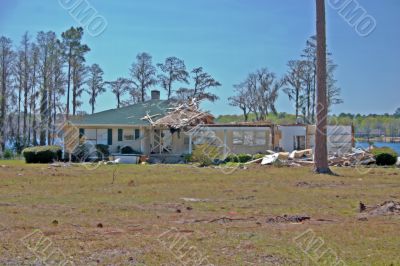 wind damaged home