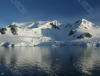 Reflections of mountain with glaciers