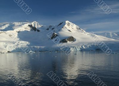 Reflections of mountain with glaciers