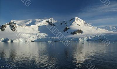 Reflections of mountain with glaciers