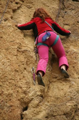 Young woman climbing