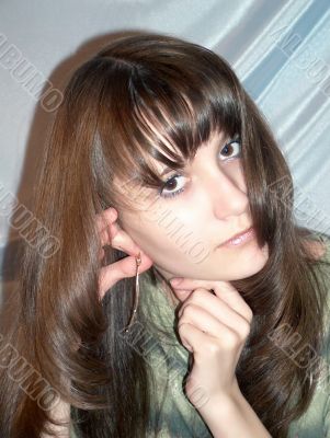 The girl who is trying on jewels