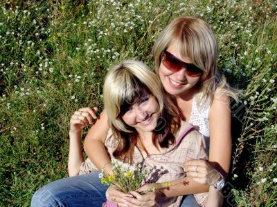 Happy girls in flowers