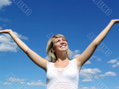 Happy girl in clouds