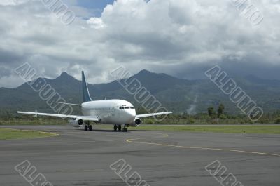 airplane at airport lane
