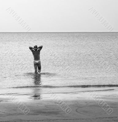 young man in a beach
