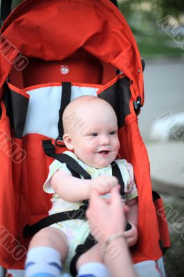 Baby in sitting stroller #1