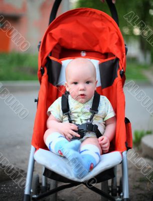 Baby in sitting stroller #6