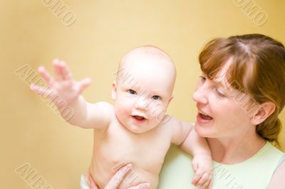 Mother holding enjoying baby #2