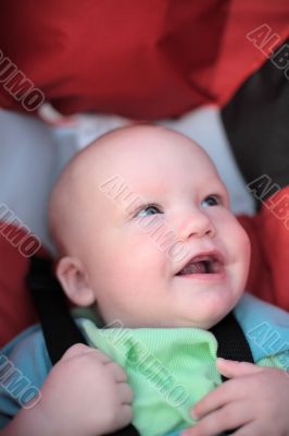 Baby sitting in stroller. Close-up #2