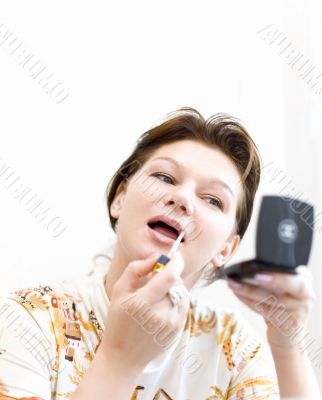 Woman doing a make-up #1