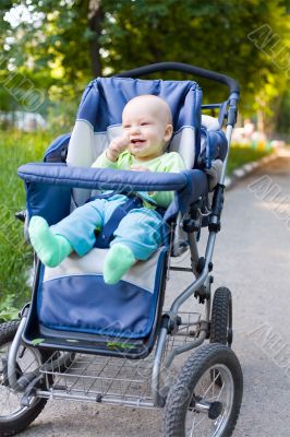 Baby in sitting stroller #10