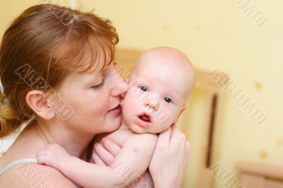 Mother gently holding baby in hands #4