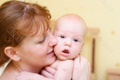 Mother gently holding baby in hands #3