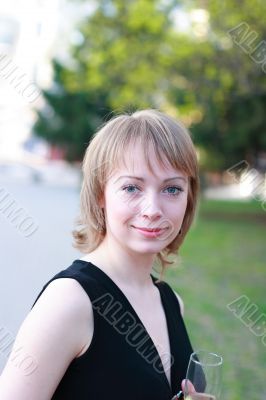 Pretty blond with glass of champagne 1