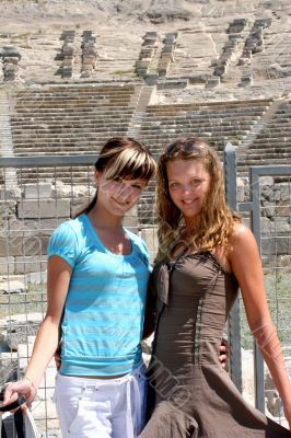 Friends   in antique amphitheatre