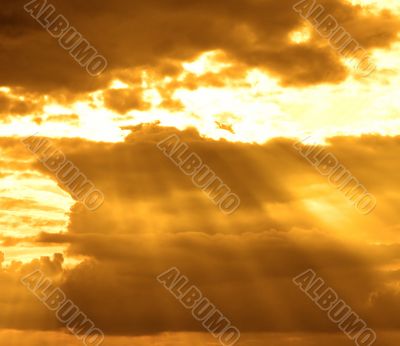 stormy cloud with sun rays